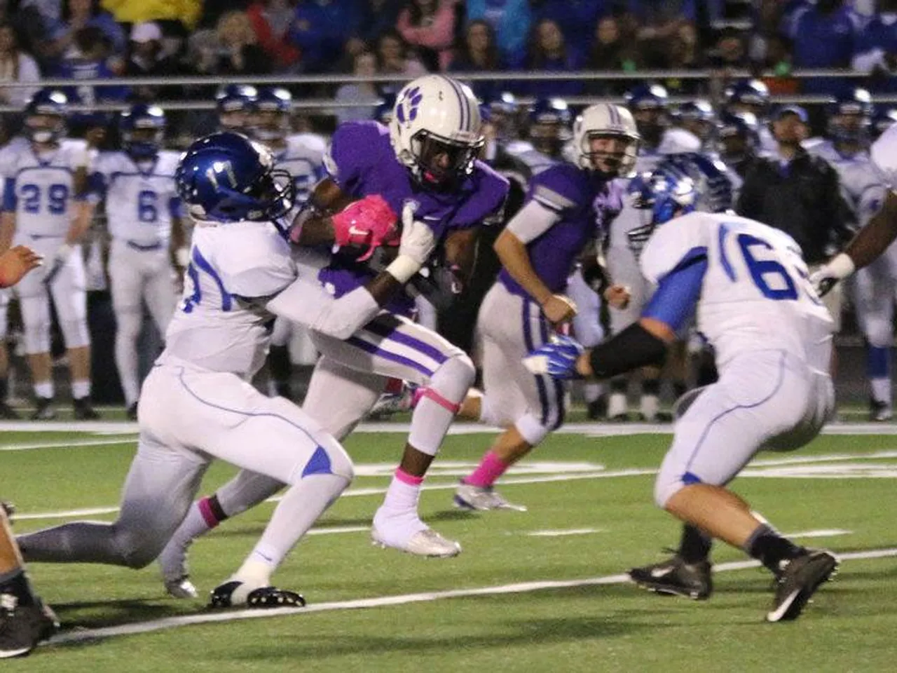 Sophomore Tijai Whatley (center) tries to get through Model's defense to pick up yardage in a game Friday, Oct. 2, 2015, at Darlington. (Photo credit: Jeremy Stewart/RN-T.com)