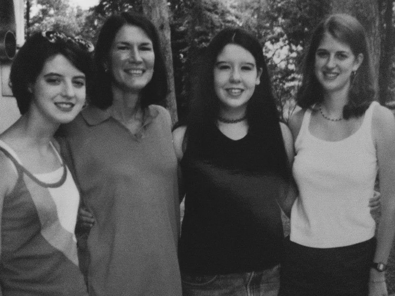 Me and my friends, Christie and Brianne, pictured with our AP Calculus teacher, Mary Holcomb, at our senior picnic.
