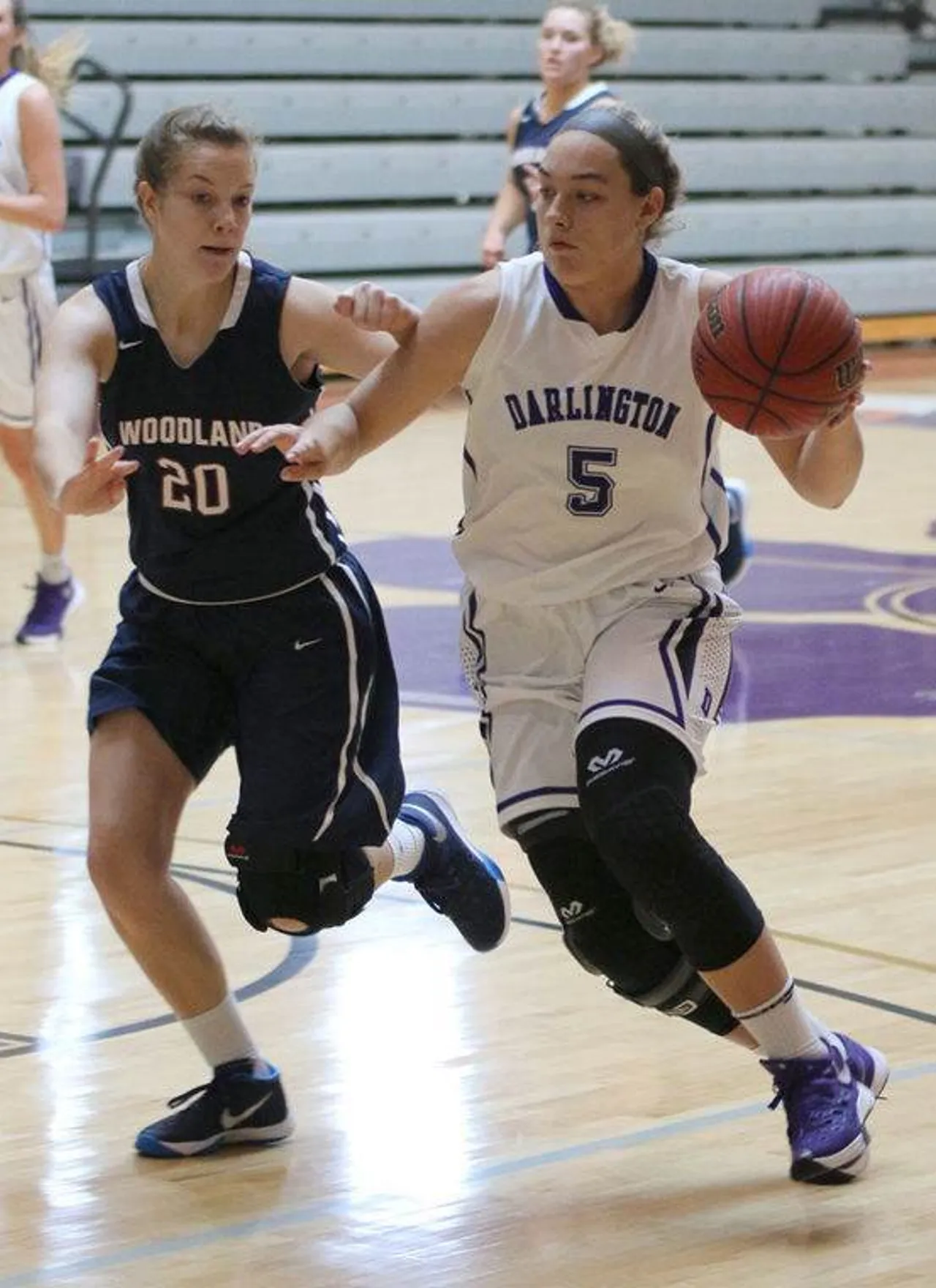 Junior Anna Claire Atha drives the ball around Woodland's Jamison Kilgo during a game at the Lady Tiger Classic on Wednesday, Nov. 25, 2015, at Darlington. (Photo credit: Jeremy Stewart/RN-T.com)