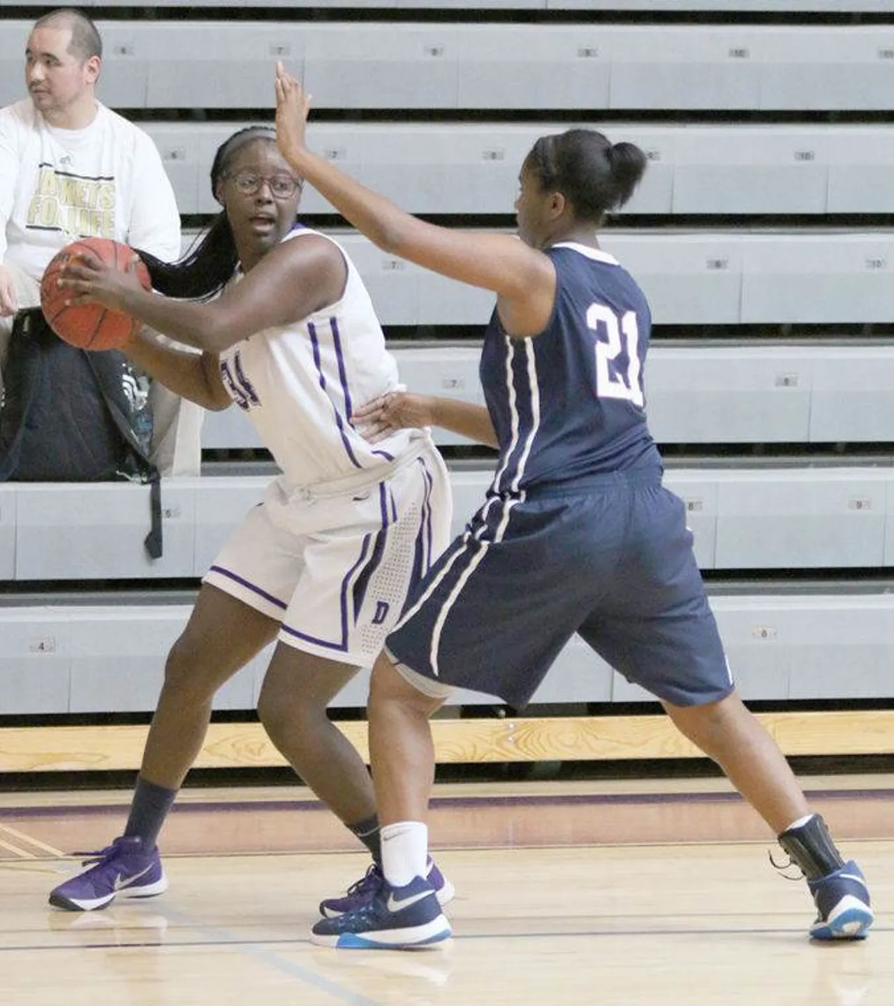 Junior Kelsey Garrett tries to find a pass around Woodland's Gabby Bradley during a game in the Lady Tiger Classic on Wednesday, Nov. 25, 2015, at Darlington. (Photo credit: Jeremy Stewart/RN-T.com)