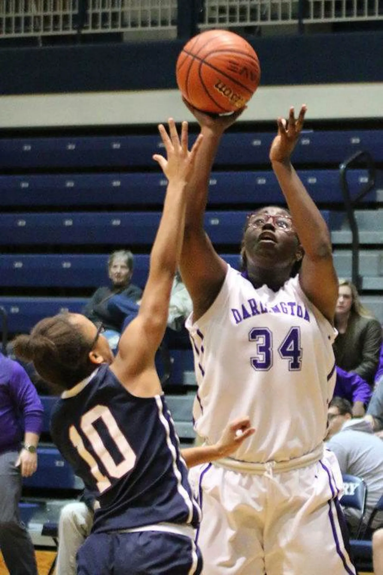 Junior Kelsey Garrett (right) takes a shot over Woodland's Aaliyah Curtis during a game Tuesday, Dec. 15, 2015, in the Holiday Festival basketball tournament at Berry College. (Jeremy Stewart/RN-T.com)