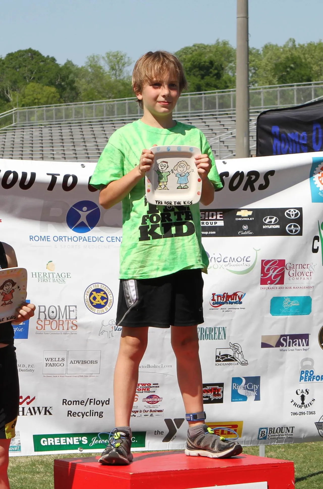 Tullis placed in first for the Elite 11-Year-Old Male group, and won third in the Senior Elite Male Overall division at the Tri for the Kids at Darlington in 2014.