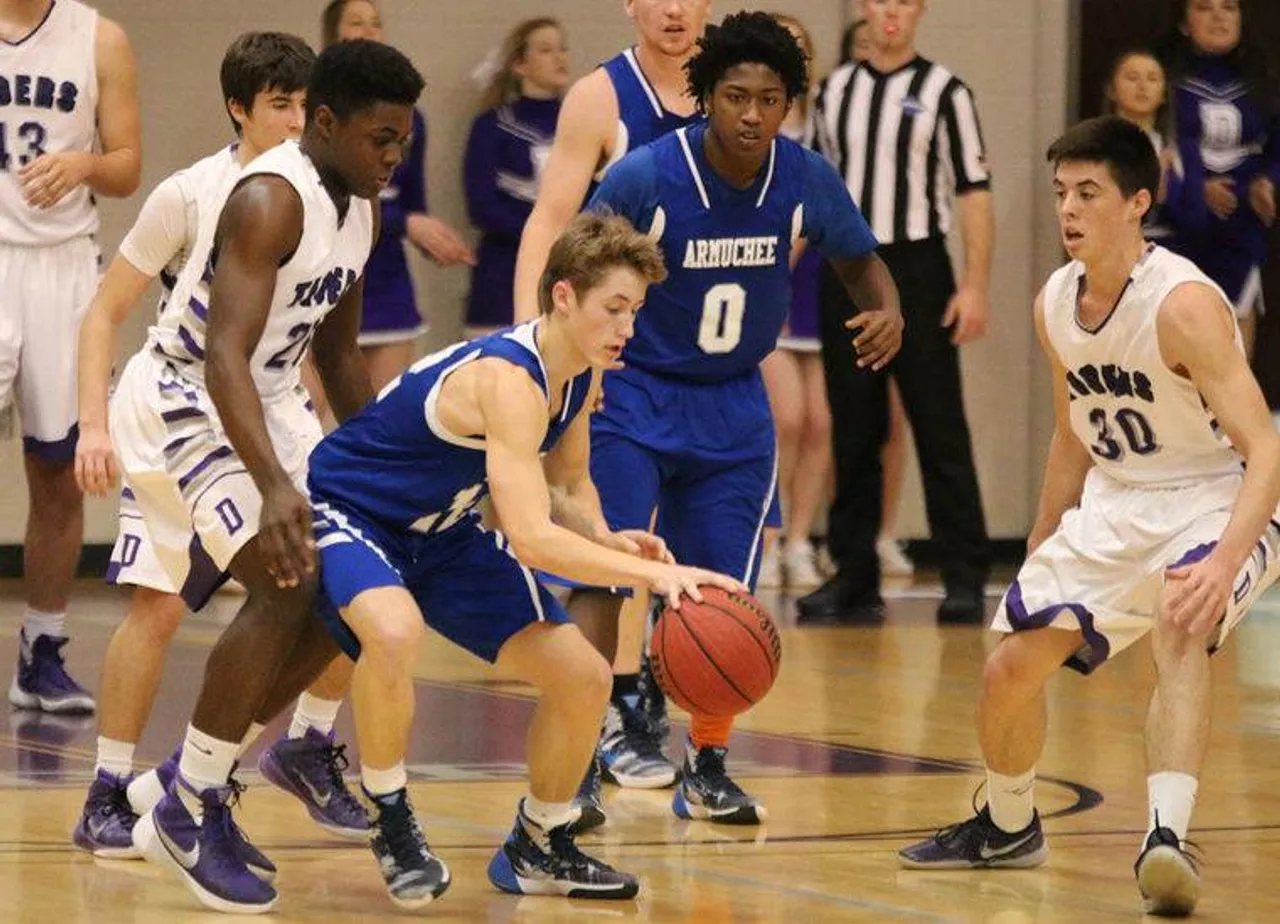 Armuchee's Chandler Teems (center) gets control of the ball while surrounded by Darlington junior Elijah McKoy (from left), Armuchee's Blake Williams and Darlington senior Kyle Tackeberry. (Jeremy Stewart/RN-T.com)