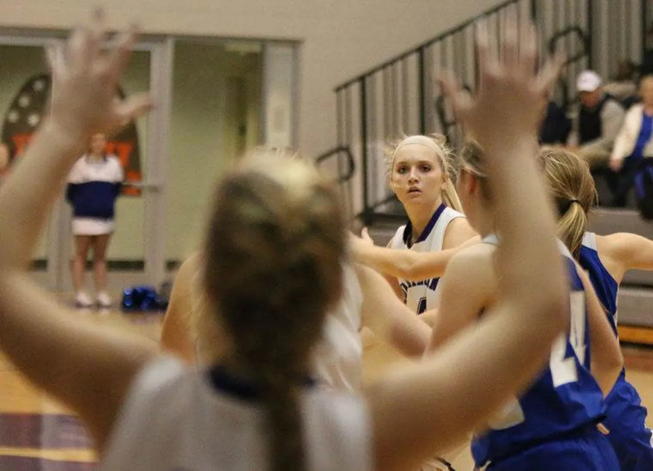 Senior Keara Evans looks past a group of Armuchee players to senior Jade Cox (foreground) while trying to pass the ball during a game Thursday, Jan. 28, 2016, at the Huffman Athletic Center. (Jeremy Stewart/RN-T.com)