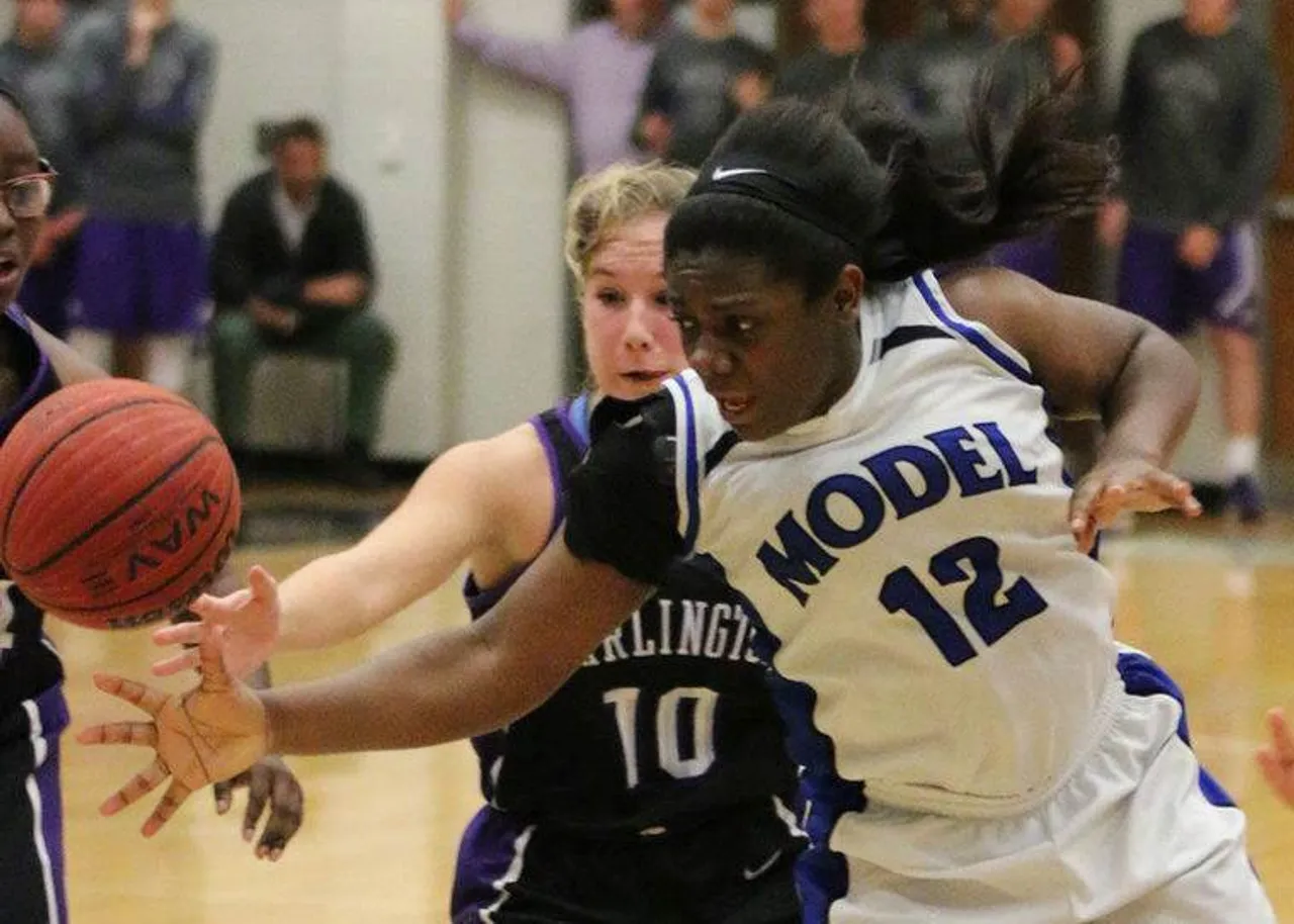 Model's Moe Welch (right) and Darlington senior Jade Cox go after the ball after Welch lost it during a game Tuesday, Feb. 2, 2016, at Model High School. (Jeremy Stewart/RN-T.com)