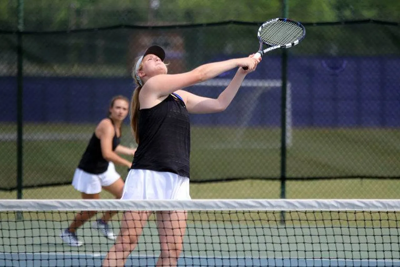 Junior Krystyna Virkler prepares to hit a high return at the net during the No. 2 doubles match against Pace Academy in the Class AA state semifinal Saturday, April 30, 2016, at Darlington School. (Jeremy Stewart/RN-T.com)