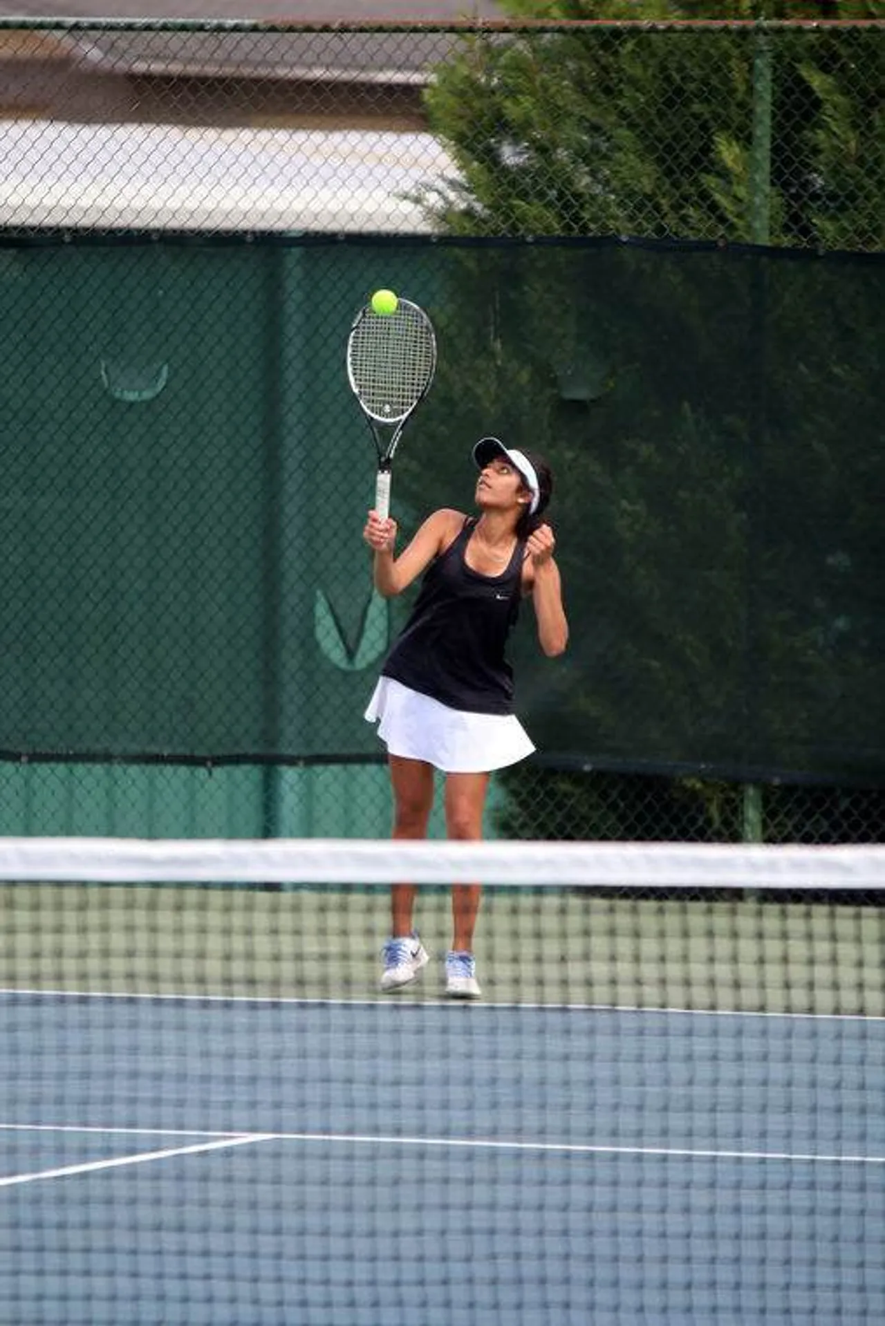 Sophomore Ishani Desai serves the ball in her No. 3 singles match against Pace Academy's Nicole Shafer in the Class AA state semifinals Saturday, April 30, 2016, at Darlington School. (Jeremy Stewart/RN-T.com)
