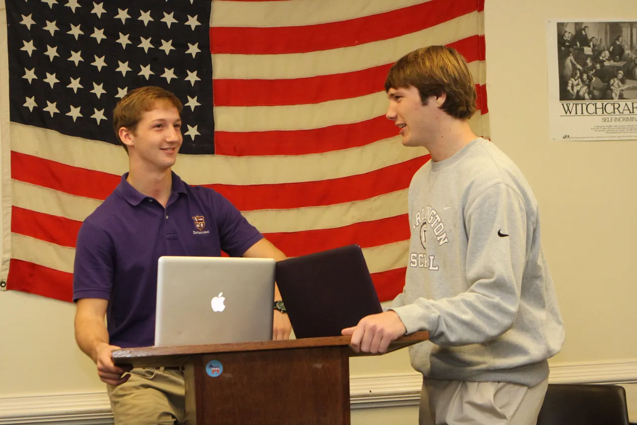 Kelly McDurmon’s class studied presidential elections that occurred from 1815-1850, during which changes in attitudes across the nation led to many political alterations across the country. Students used Google Apps to collaborate during the group research process. Their final project was a campaign commercial recreating the issues of the time, which they presented just before participating as characters in a reenacted debate for the class. Here, Chandler Duggan (’14) and Thomas Gilbert (’14) square off in front of the 48-star flag to debate early American politics.