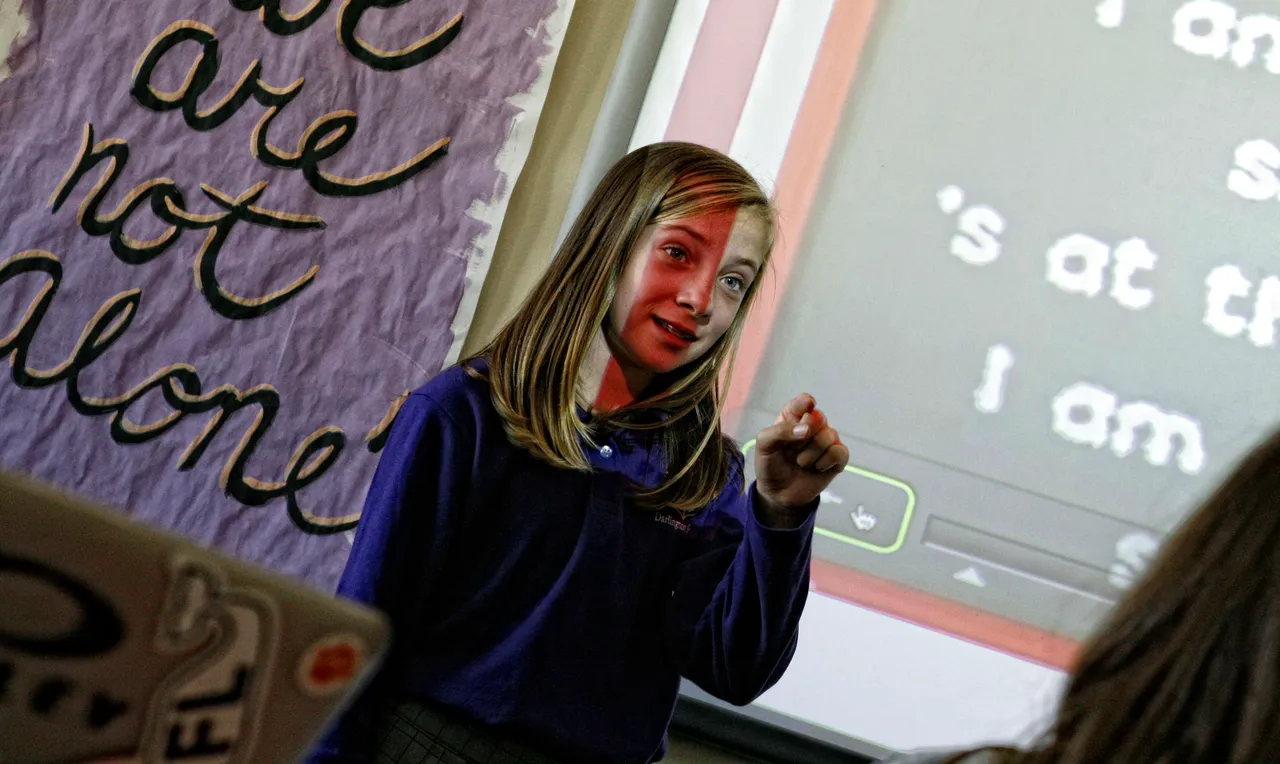 Madeline Dillmon (’18) presents a grammar topic during Kate Willingham’s class. She and her classmates were put in groups and assigned a grammar topic to teach (as part of a review). This picture was taken as she and the rest of her group taught the class about their assigned topic, possessive nouns. Presentations like these are a great alternative to traditional assessments like worksheets or lectures because they force the student to develop a deeper understanding of the topic as they work through the clarity of their communication. And some days, students just listen better to each other.