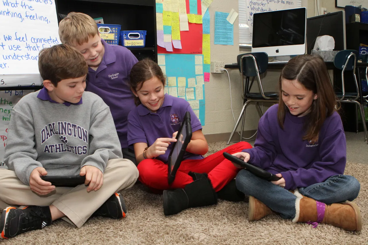 <p>Fourth-graders take their reading a step further by reflecting on the days Reading Workshop mini-lesson while blogging on their current reading assignment. Teacher Flo Anthony makes sure this is an authentic learning experience by having students record and share their thoughts on their iPads, making students authors, readers, and collaborators during the process.

<p>Here, Madeline Bradshaw (’21)  reviews her latest blog entry.
Here, John Andrew Cash (’21), Cooper Cates (’21), Madeline Bradshaw (’21) and Ivy Watters (’21) share and comment on each other’s blogs.