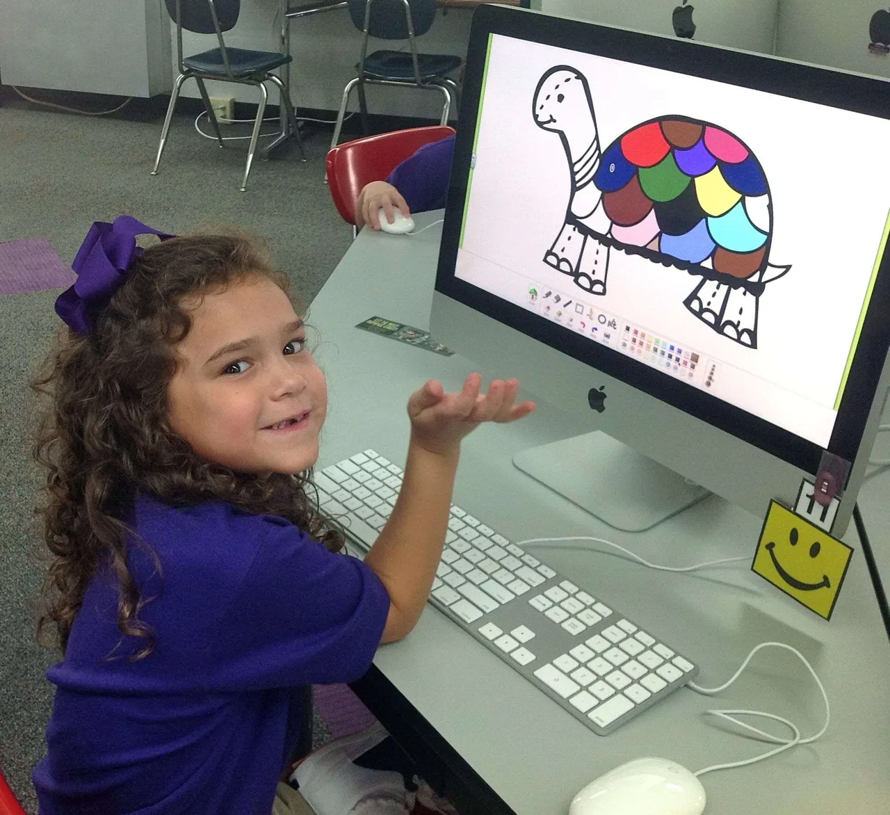The Lower School Computer Lab is an extension of the classroom. Students take topics from their classes and come to the lab to dig deeper into their subjects using technology to do project-based learning. As classroom topics are explored, a technology curriculum is also integrated, which includes topics such as internet safety, digital citizenship, and computer skills like keyboard and mouse skills. The lab is outfitted with 21 iMacs. Here, Chatlie Hernandez (’25) uses Doozla to draw a picture, which will act as a writing prompt for a lesson on turtles.