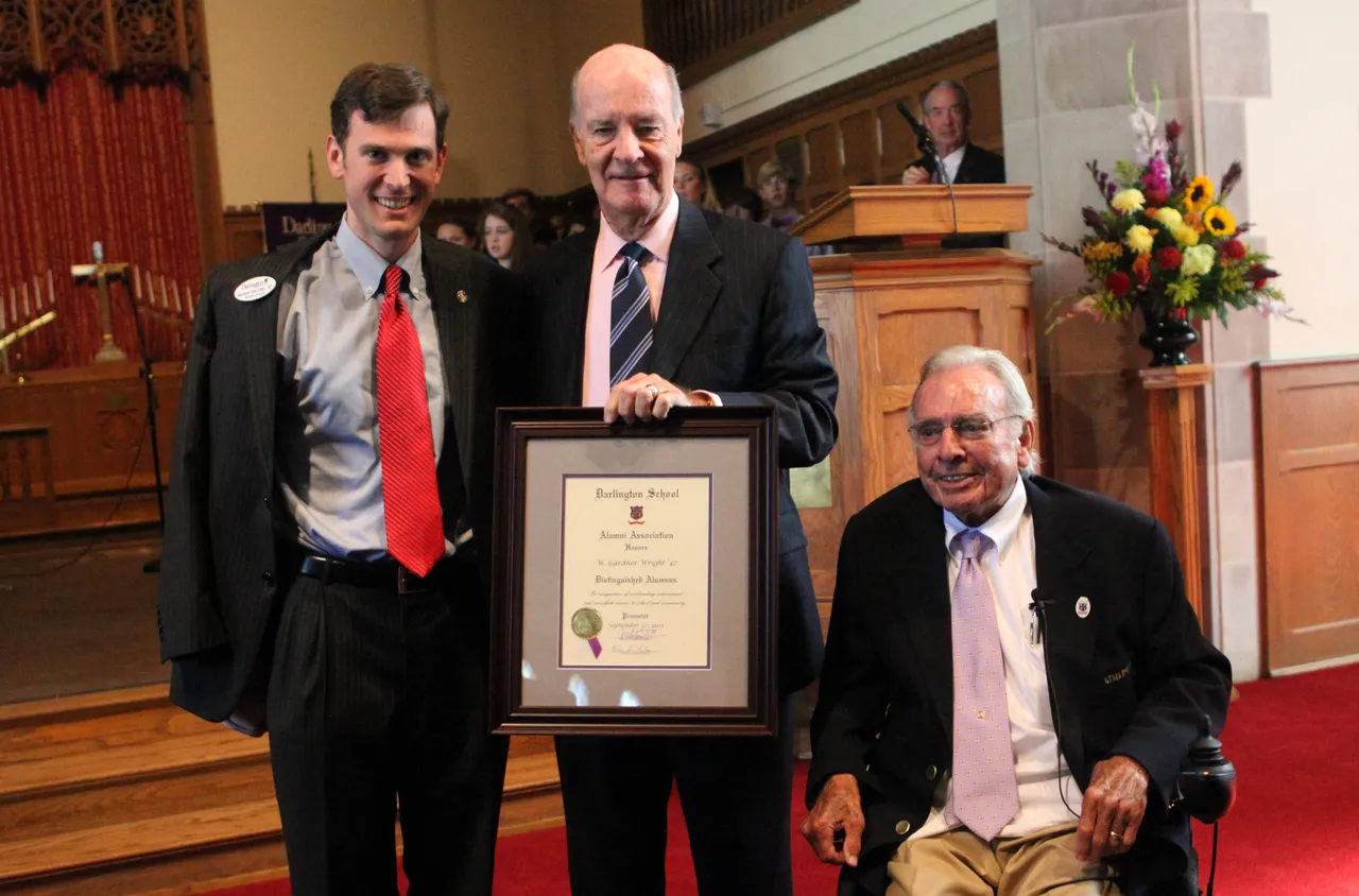 Alumni Council President Michael Van Cise ('97) and Chairman of the Board of Trustees Jere Drummond ('57) present Gardner Wright ('47) with the 2013 Distinguished Alumnus Award.