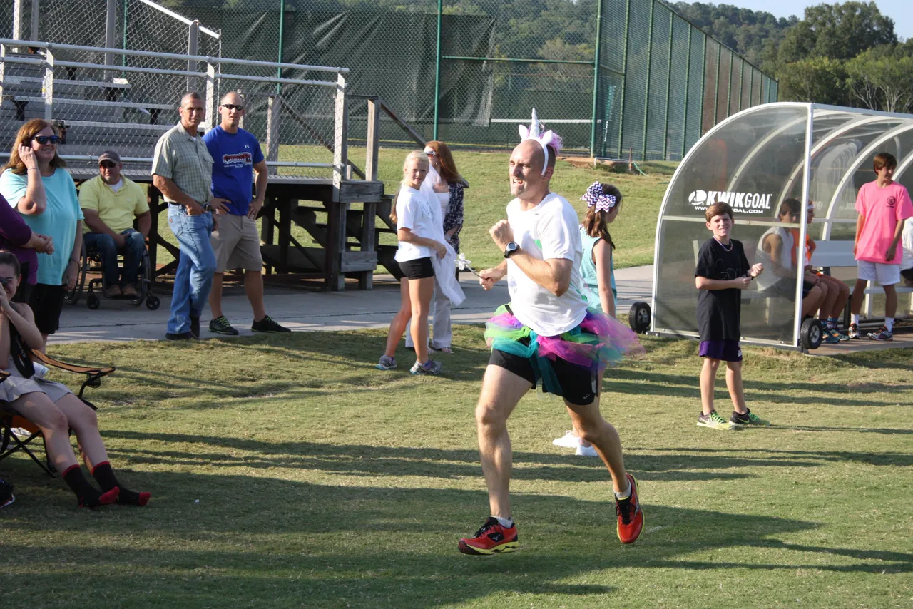 Mr. Malmberg competes in Darlington's annual ekiden, a relay event in which four team members each run two miles.