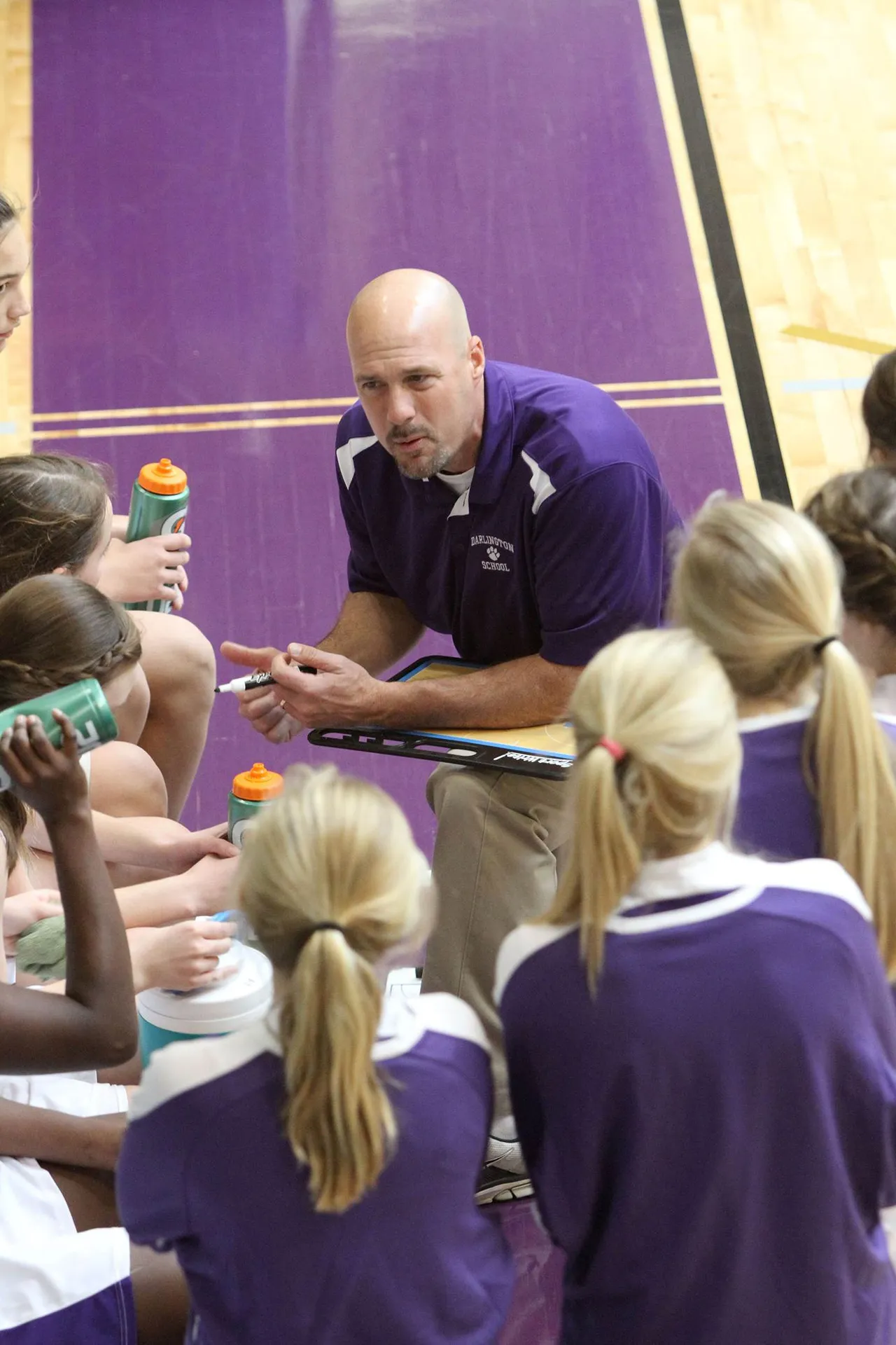 Tommy Atha coaches football and basketball at Darlington.