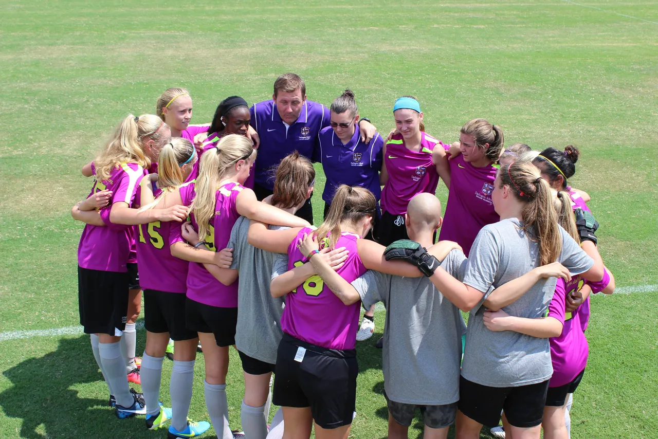Erin cheers on her Soccer Academy teammates in their first game of the season.