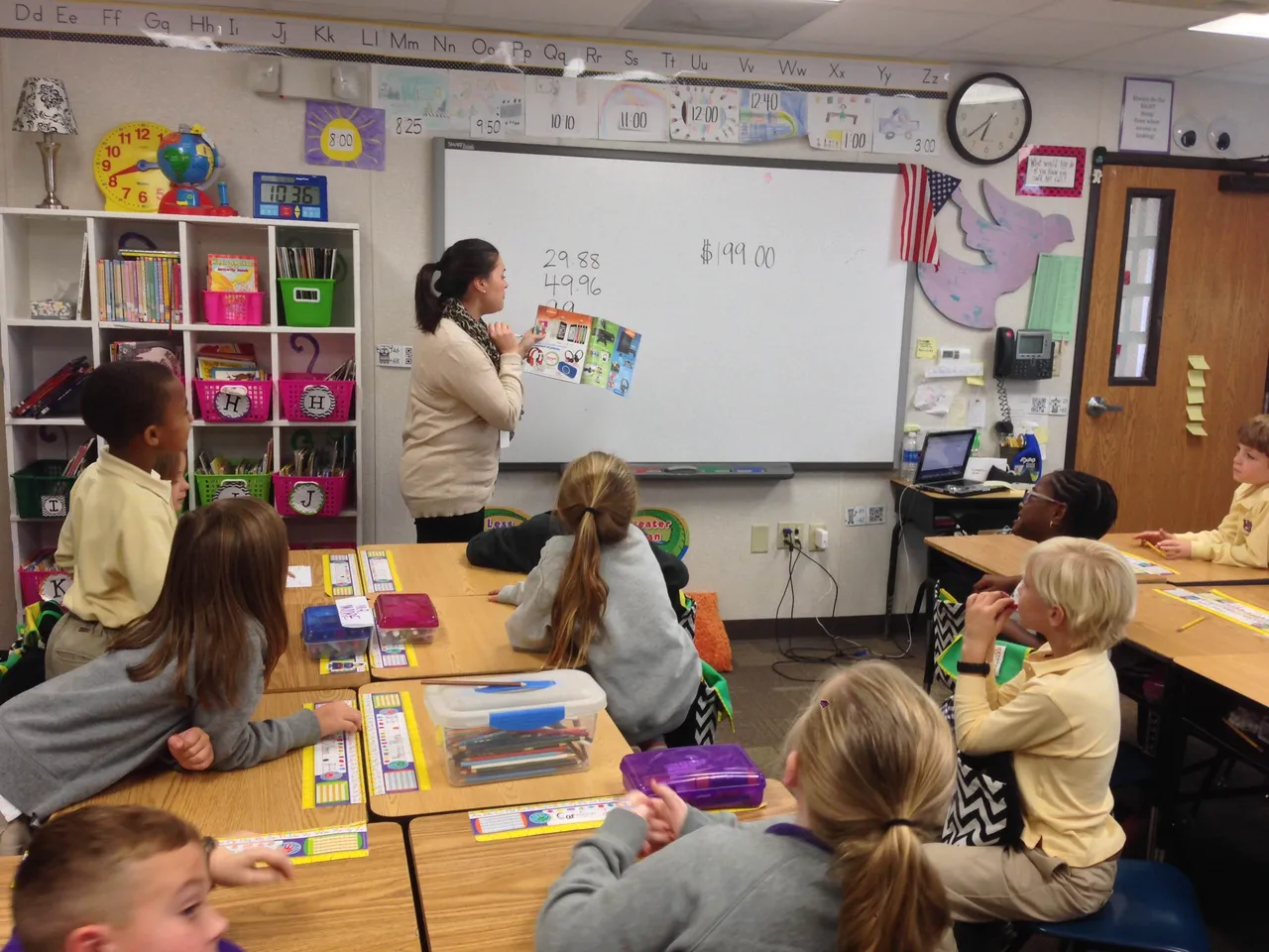 Mrs. Ray teaches math and budgeting in the second grade using a Wal-Mart Christmas Wish List.