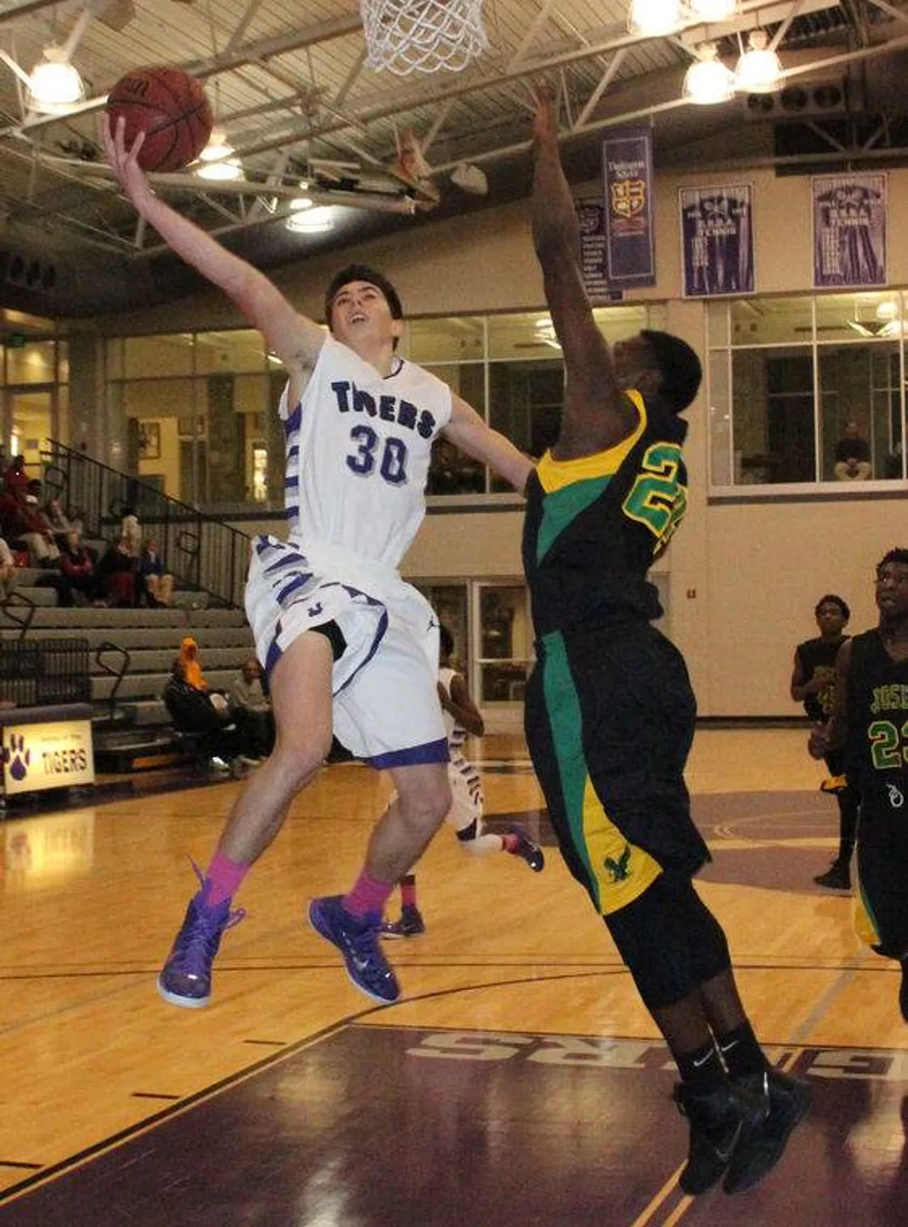 Kyle Tackeberry (30) goes for a layup against T.W. Josey High School at Darlington on Saturday, Jan. 10, 2015. (Photo credit: Sierra Campbell/Rome News-Tribune)