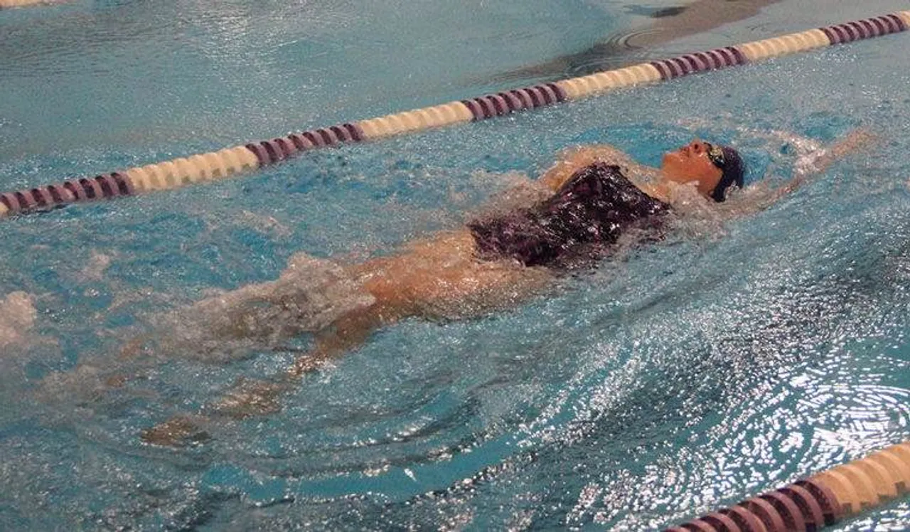 Junior Mary Margaret Wright swims the backstroke at Darlington on Thursday, Jan. 22, 2015. (Photo credit: Sierra Campbell/Rome News-Tribune)