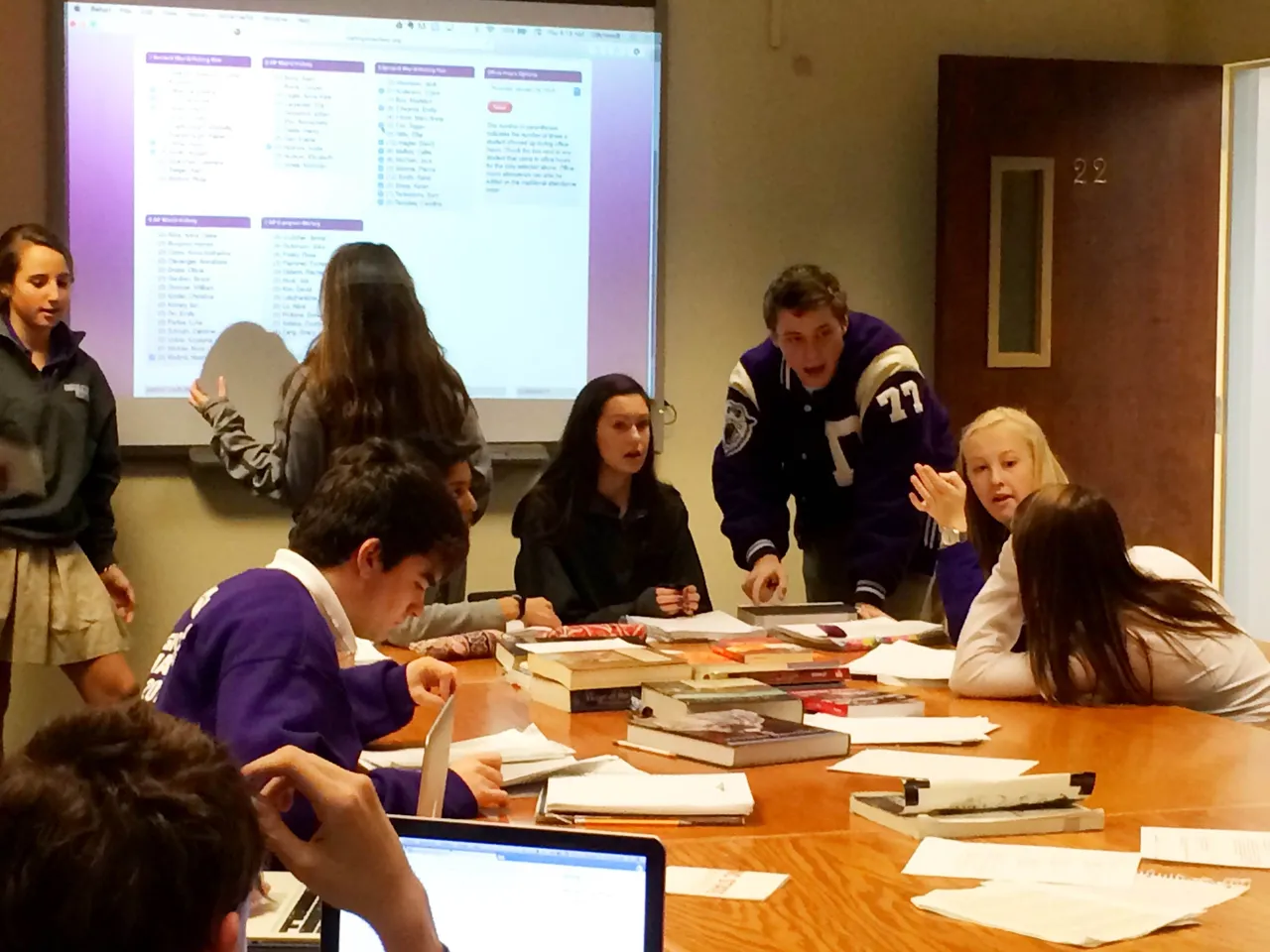 The morning started in Craig Schmidt's room, where many students congregated for office hours before advisory began.