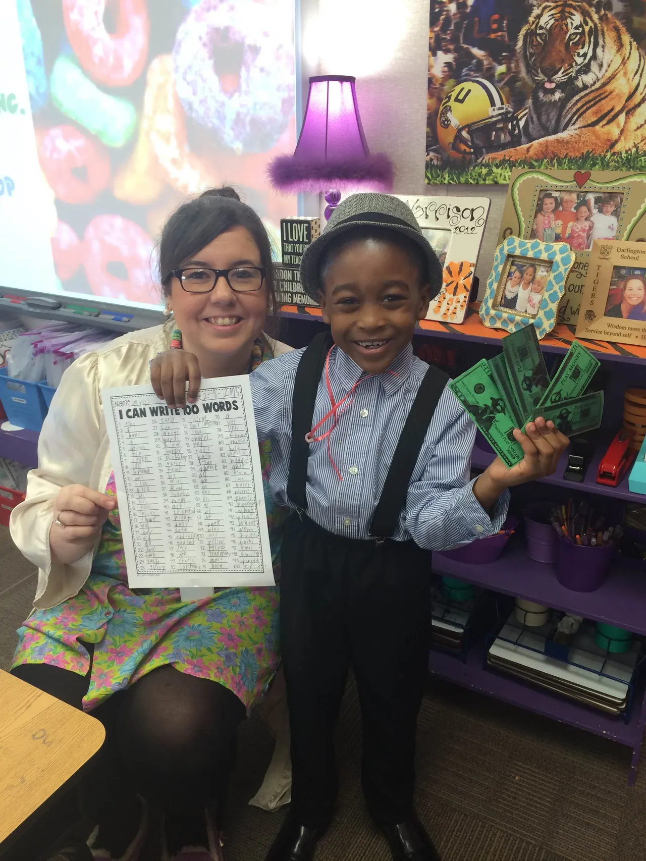 Myles finished his list of 100 words first in his class. All words had to be legible and spelled correctly. As a prize, he got 100 Captain Rodney Dollars!