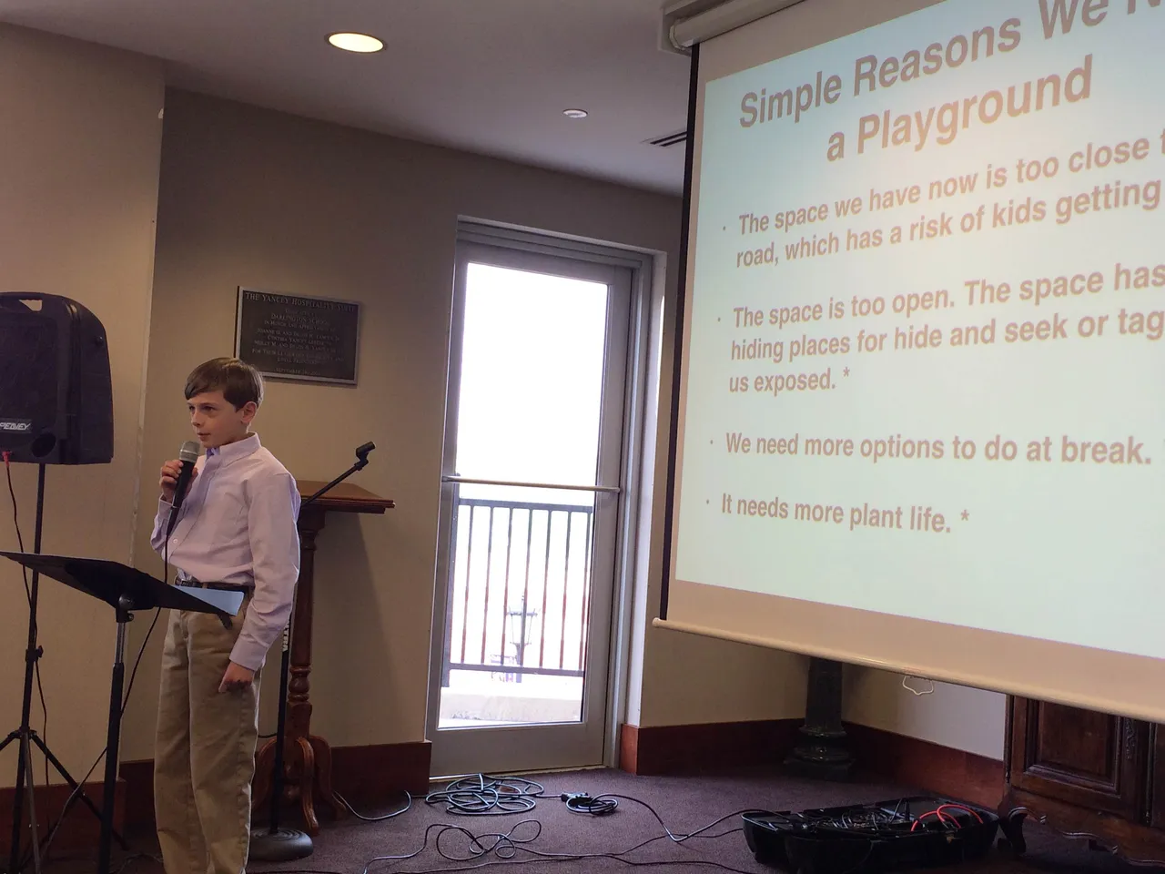 Fifth-grader Brock Lignell explains the reasoning for a new playground.