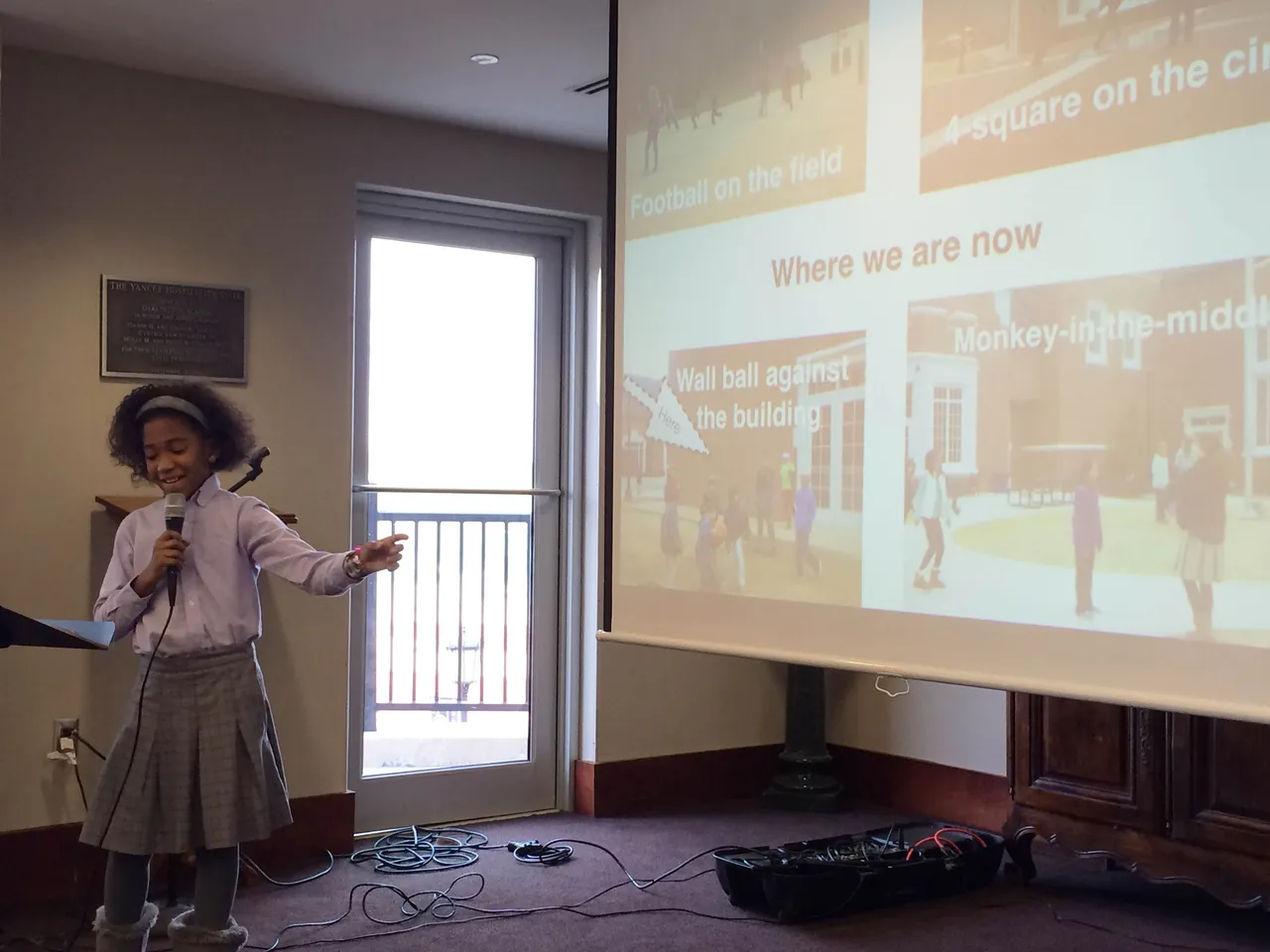 Fourth-grader Christa Twyman presents on what students do now for exercise during break time.