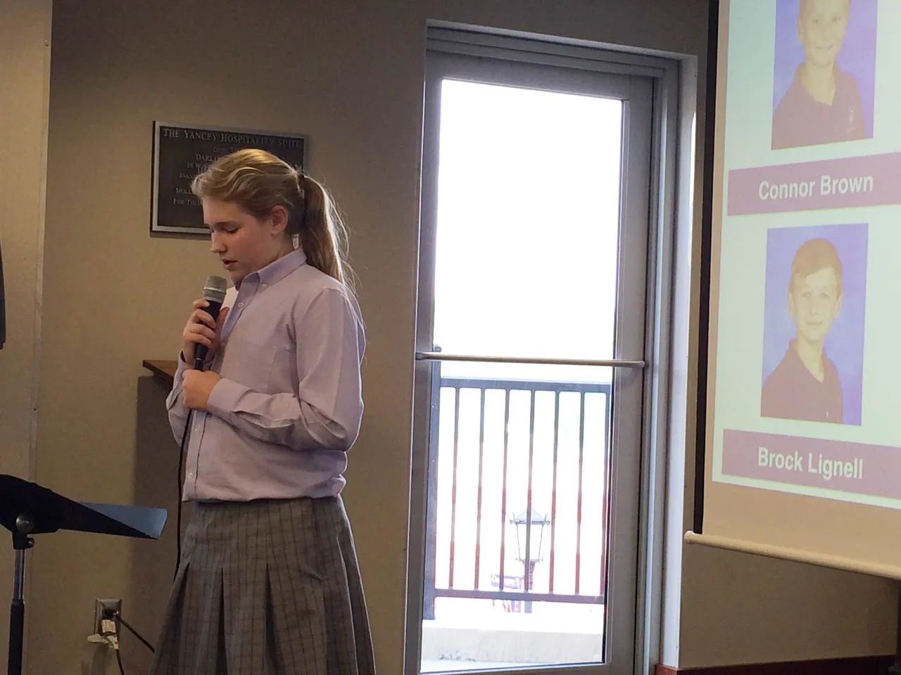 Fifth-grader Sarah Tunnell speaks about the playground project.