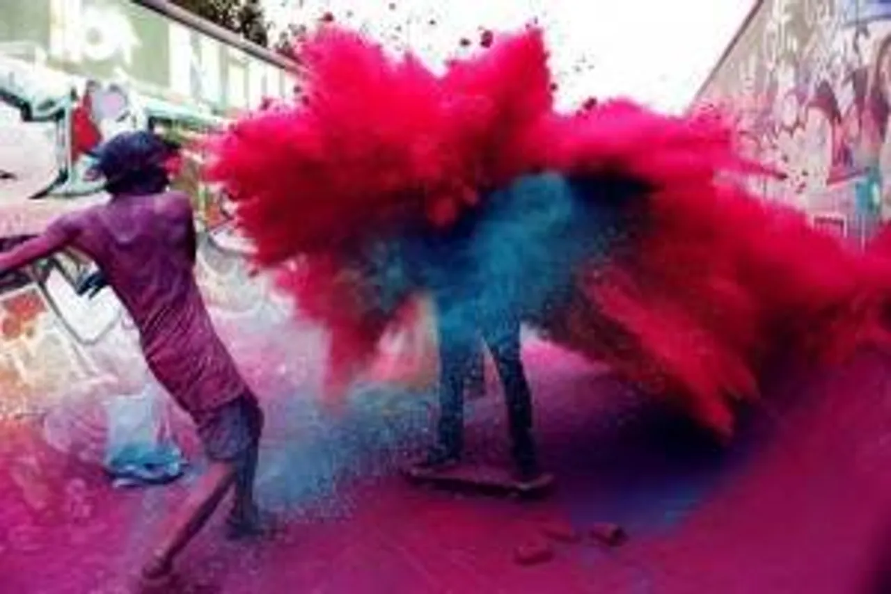 The color fight can often get very messy as seen here. 
Photo: holihindufestival.com