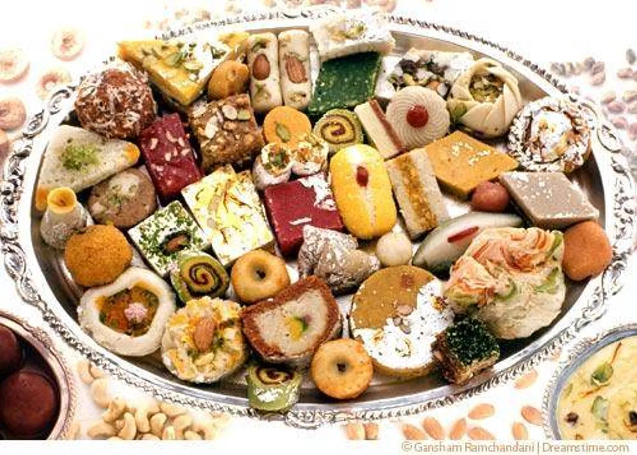 This is an example of the common dish of Indian sweets exchanged by families and friends during the evening of Dhuleti. Photo: food.krishna.com