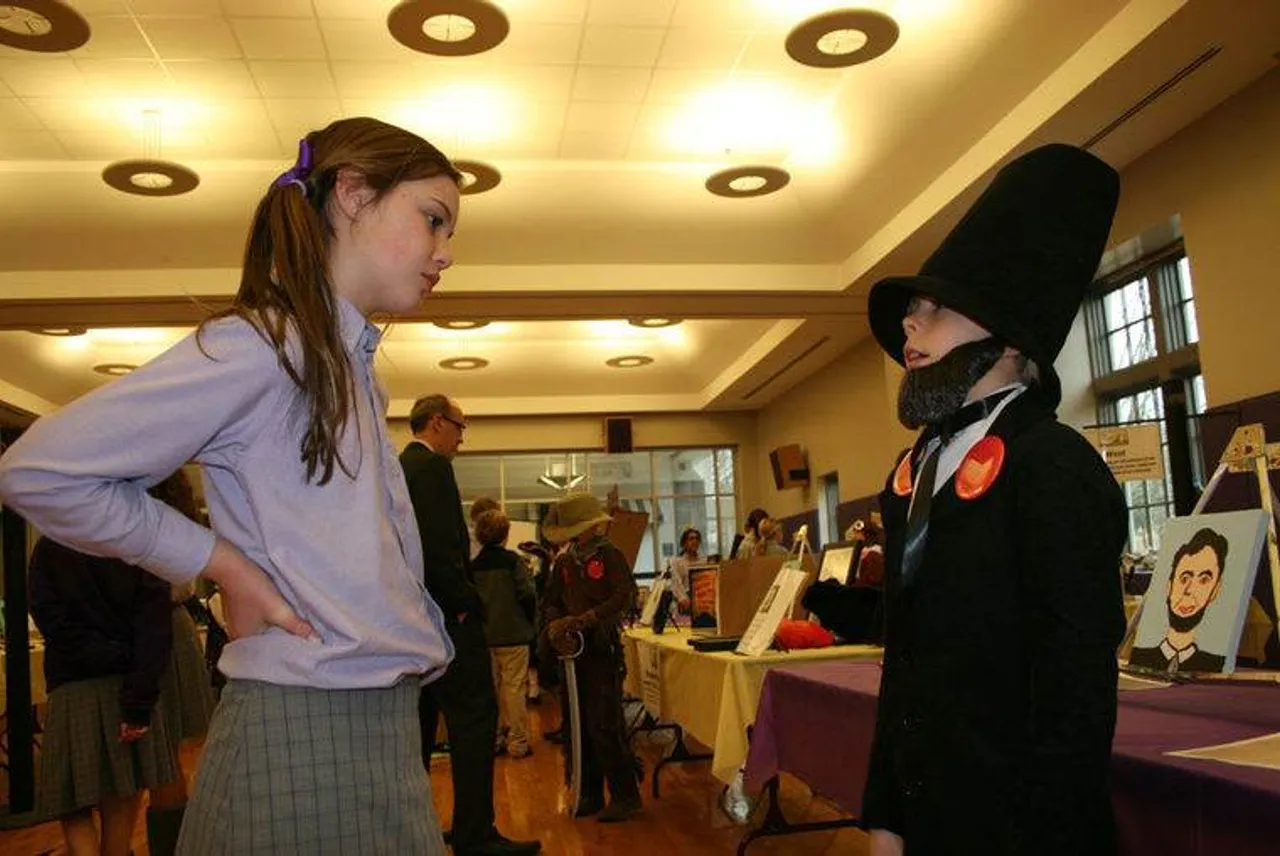 Darlington fifth-grader Amelia Whitefield listens to Maddox Pyle as Abraham Lincoln give his speech during the Darlington Wax Museum. (Photo credit: Kristina Wilder / RN-T.com)