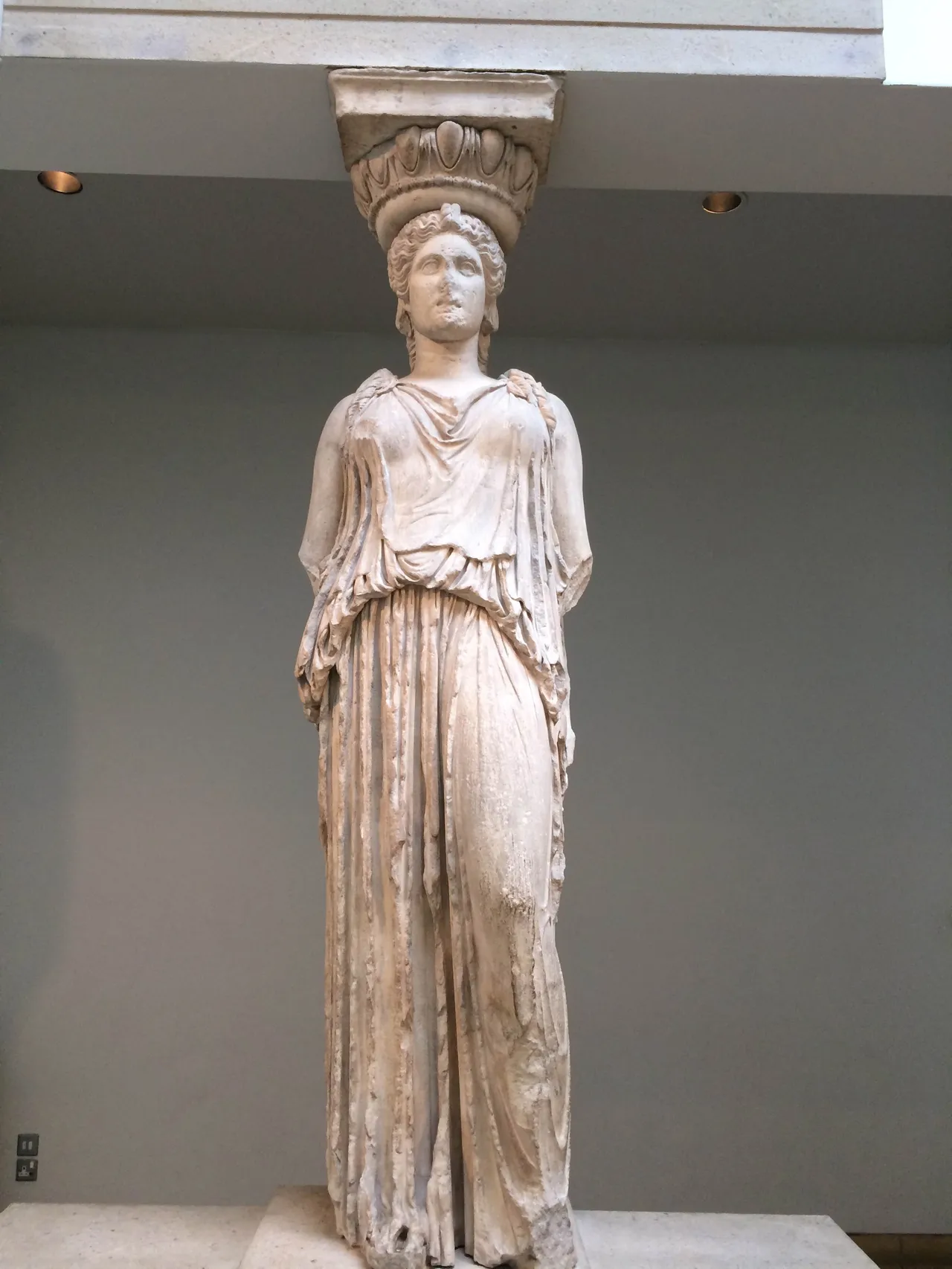 Caryatid from the Porch of the Maidens.  Located in the Erechtheion temple on the acropolis in Athens.