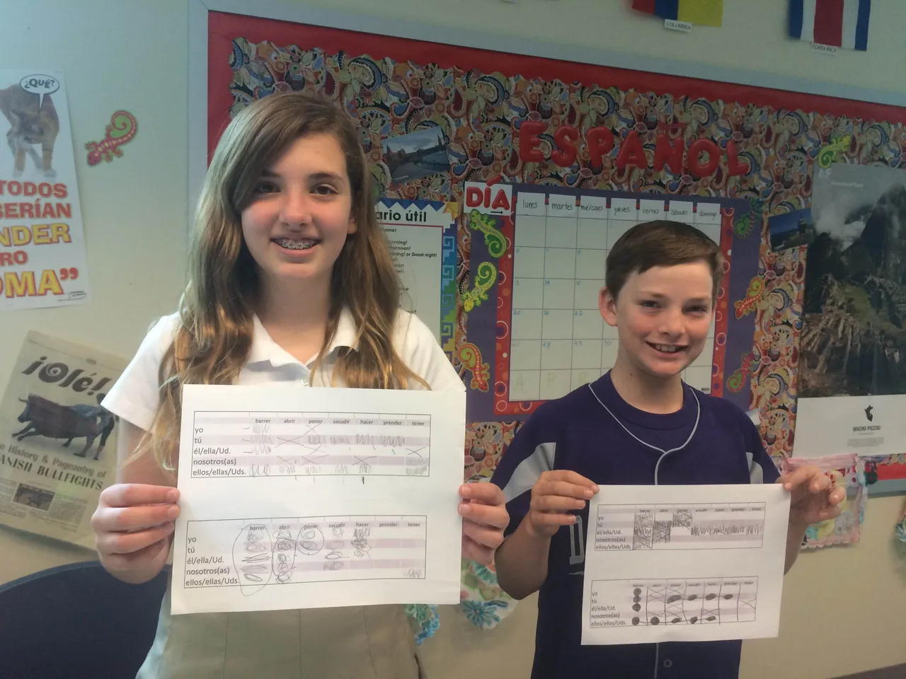 Batalla Naval partners Ashlyn and Jackson show off their game sheets.