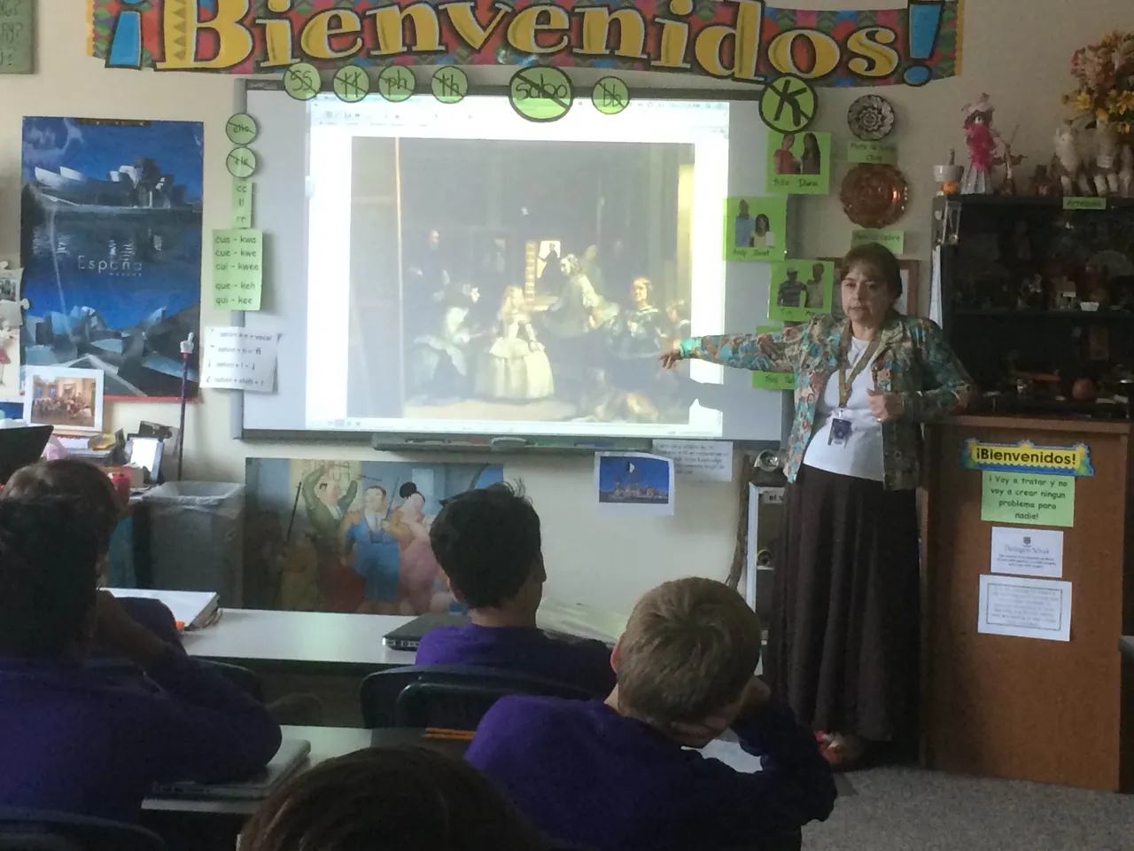 Mrs. Barfield tells the story behind Diego Velazquez's 1656 masterpiece "Las Meninas" in eighth-grade Spanish 2.