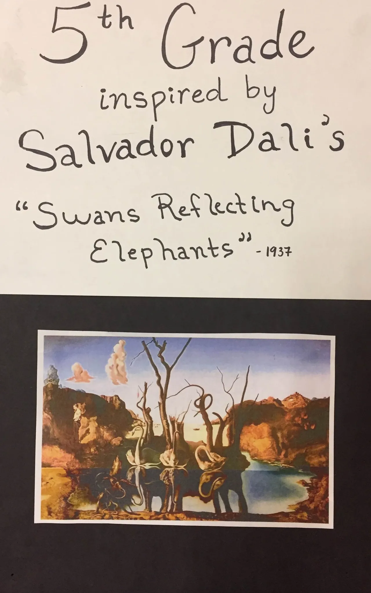 Fifth-graders drew a swan reflecting into an elephant optical illusion in oil pastel with a tempera paint sky and water resist.