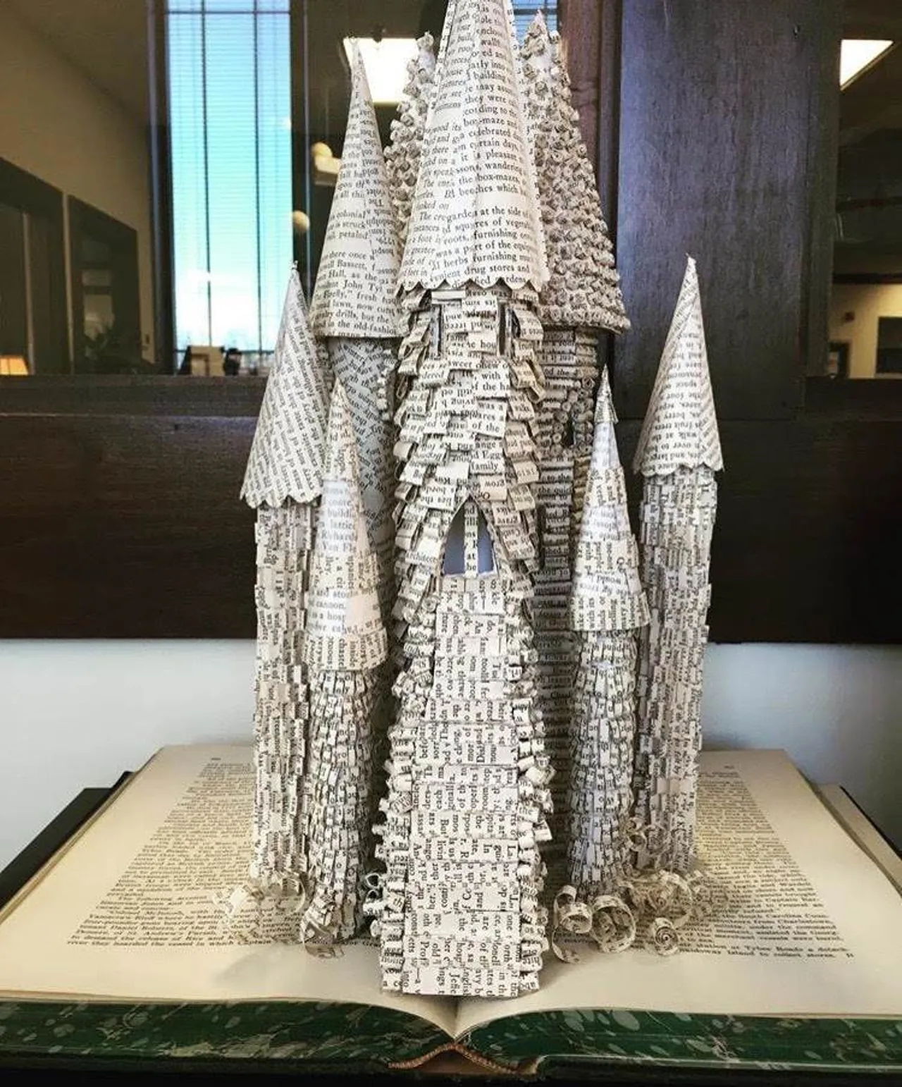 This is an up-cycled literary creation from Michael Jacobs that will be used as a centerpiece at the closing banquet of the AISL conference.