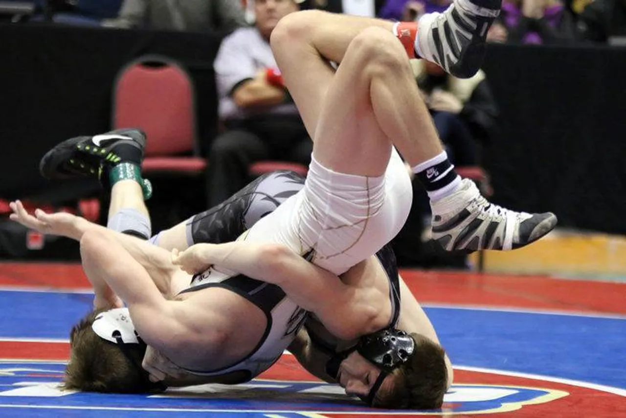 Darlington's Colton Woods (right) flips around Commerce's Kole Burchett in the Class A 126-pound state championship match Saturday, Feb. 11, 2017, in Macon. Woods used an escape to win 1-0. (Jeremy Stewart/RN-T.com)