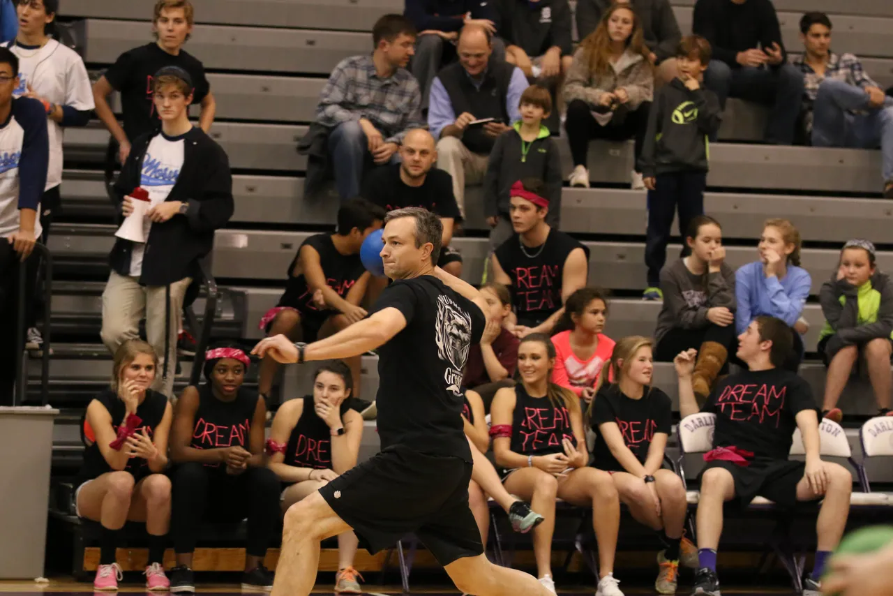 Head of School Brent Bell competes alongside students and faculty in the RUMPUS Weekend Dodgeball Tournament.