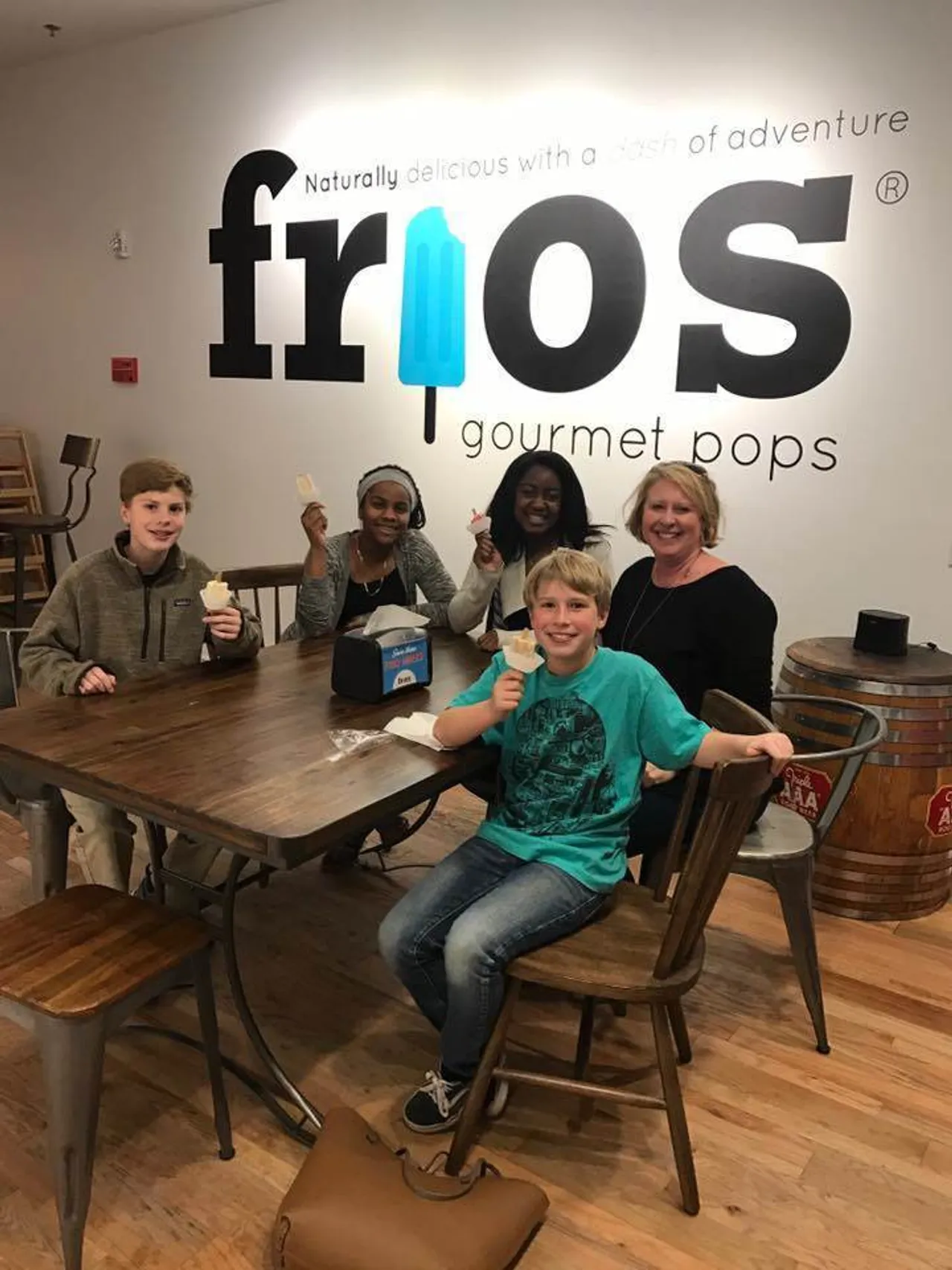 The Bagby family treats some of our boarding girls to popsicles at Frios.