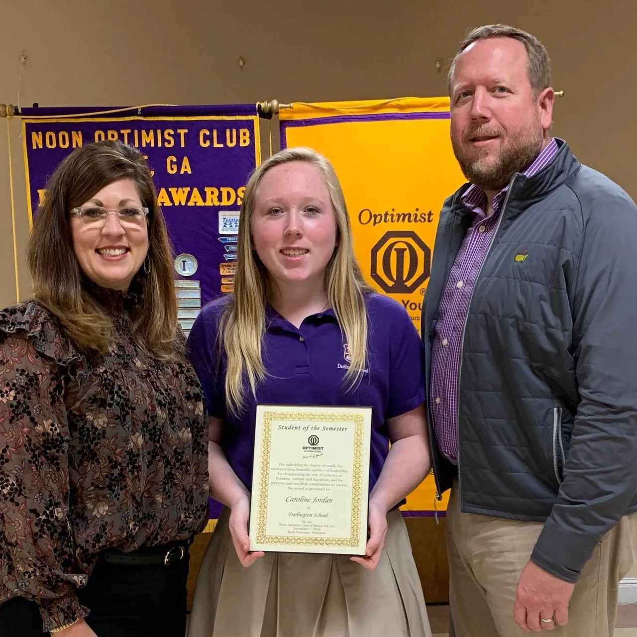Caroline Jordan with her parents, Molly and Jason