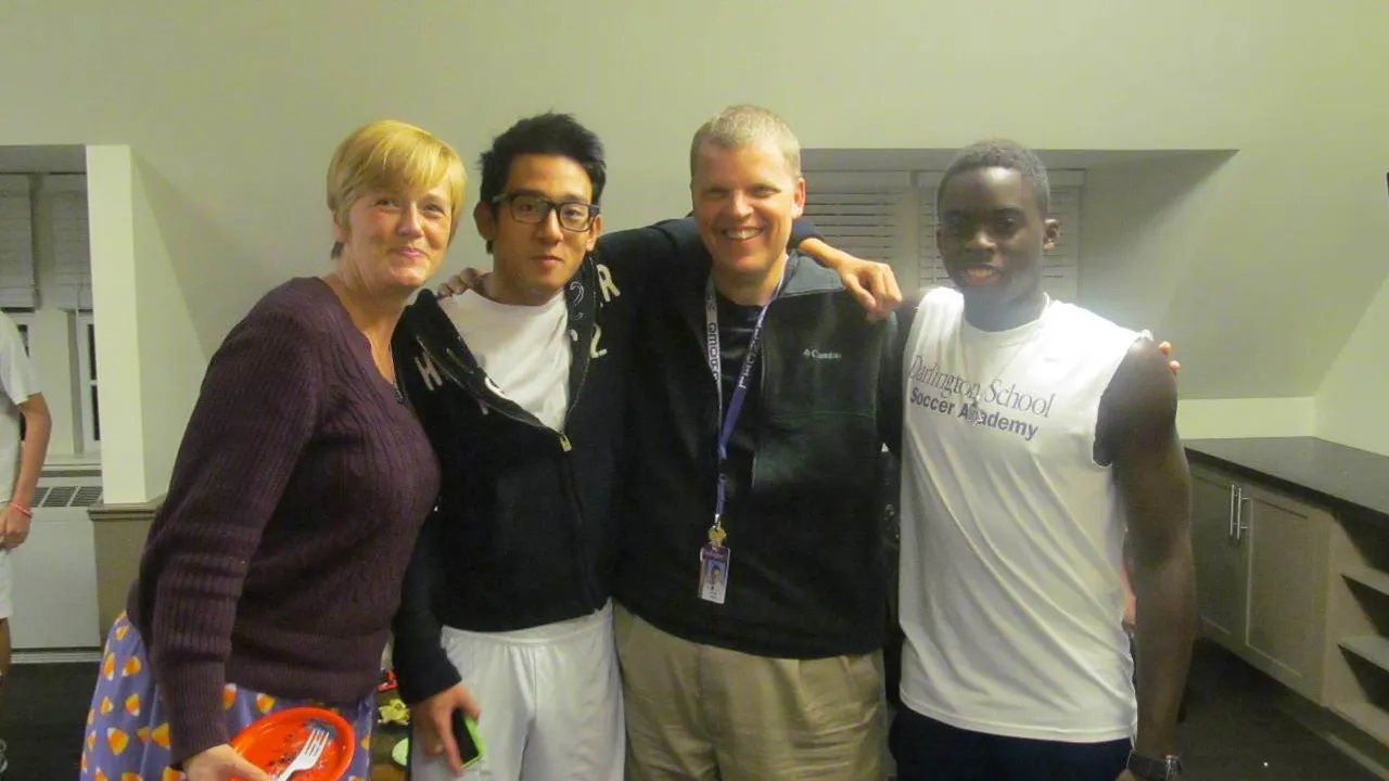 Bebe Zazzaro, Wonseok Lim '14, Doug Hamil, and Ian Winder '14 celebrating fall birthdays in Neville House in 2012.