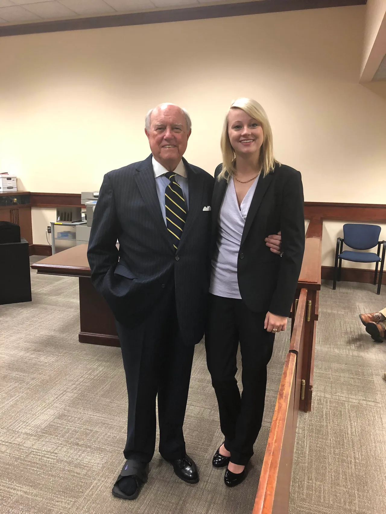 Sam Moss ('63) and Leah Mayo ('11, LD '22) at her swearing in ceremony