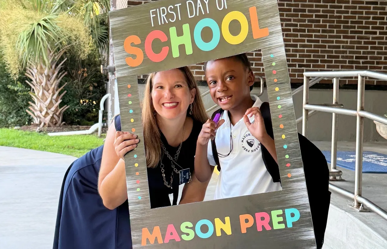 Fun photo of Mason Prep teacher and student